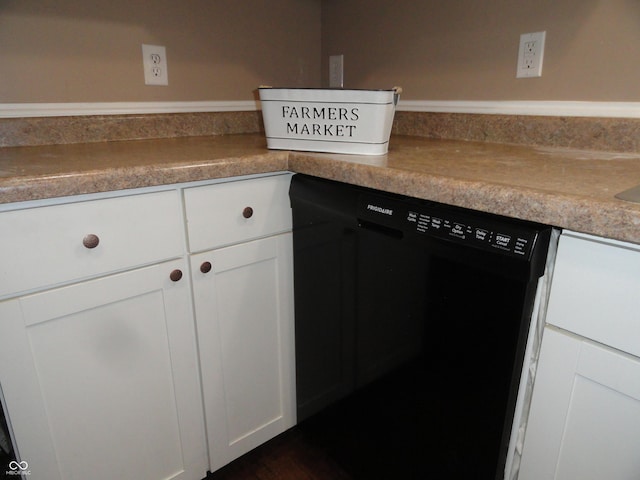 2502 N Harding St, Indianapolis, IN 46208 - kitchen view of black dishwasher and white cabinets
