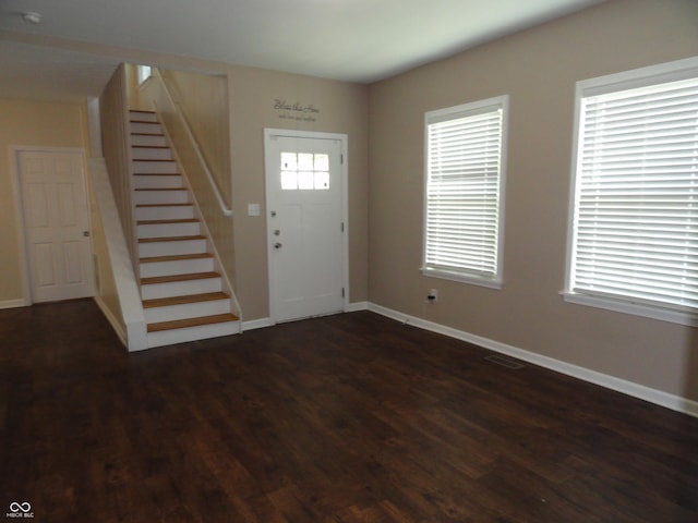 2502 N Harding St, Indianapolis, IN 46208 - foyer entrance with stairway and dark wood-style flooring