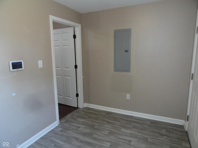 2502 N Harding St, Indianapolis, IN 46208 - unfurnished room with electric panel and wood finished floors
