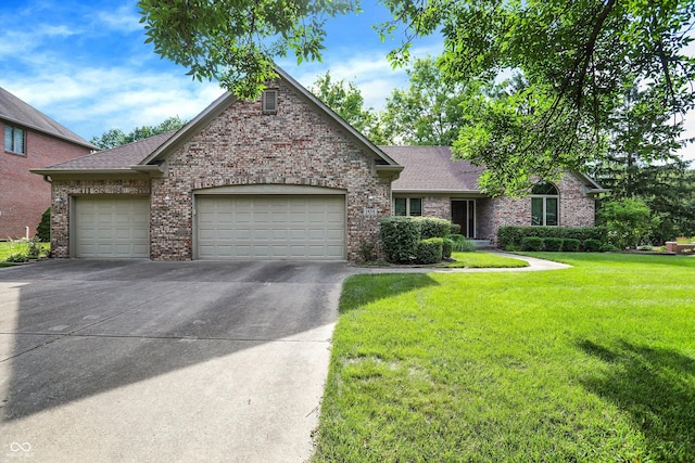 1456 Bent Tree Pl, Greenwood, IN 46143 - view of front facade featuring driveway, brick siding, an attached garage, and a front lawn