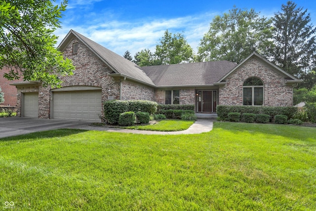 1456 Bent Tree Pl, Greenwood, IN 46143 - view of front of home featuring brick siding, a front yard, an attached garage, a shingled roof, and driveway
