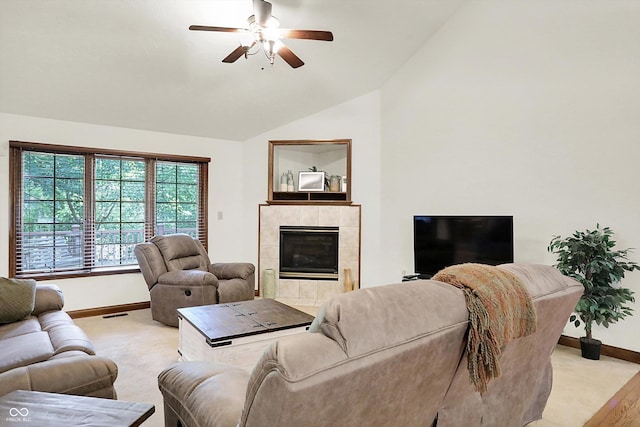 1456 Bent Tree Pl, Greenwood, IN 46143 - living room with vaulted ceiling, a ceiling fan, a fireplace, and light carpet