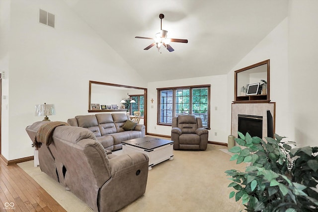 1456 Bent Tree Pl, Greenwood, IN 46143 - living room featuring high vaulted ceiling, ceiling fan, and a tile fireplace