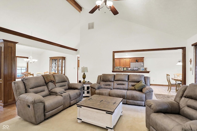 1456 Bent Tree Pl, Greenwood, IN 46143 - living room with ceiling fan, high vaulted ceiling, a chandelier, and beam ceiling