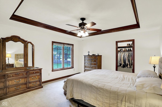 1456 Bent Tree Pl, Greenwood, IN 46143 - bedroom with a tray ceiling, crown molding, light carpet, a ceiling fan, and a closet