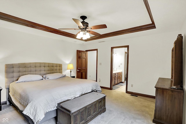 1456 Bent Tree Pl, Greenwood, IN 46143 - bedroom with a tray ceiling, light carpet, ceiling fan, ensuite bathroom, and crown molding