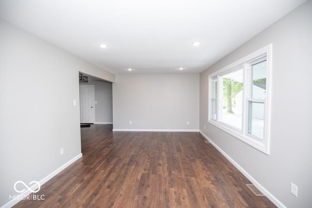 1855 E Deb Dr, North Vernon, IN 47265 - empty room featuring dark wood finished floors and recessed lighting