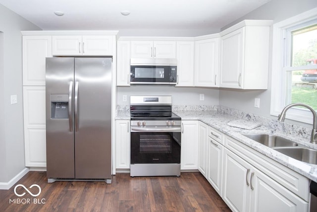 1855 E Deb Dr, North Vernon, IN 47265 - kitchen featuring stainless steel appliances, white cabinetry, and dark wood-style flooring