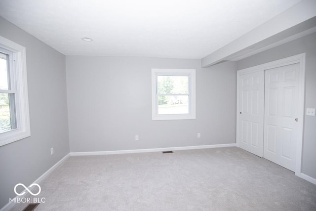 1855 E Deb Dr, North Vernon, IN 47265 - unfurnished bedroom with carpet flooring and a closet