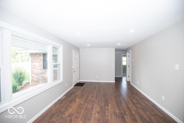 1855 E Deb Dr, North Vernon, IN 47265 - empty room featuring dark wood-type flooring and recessed lighting