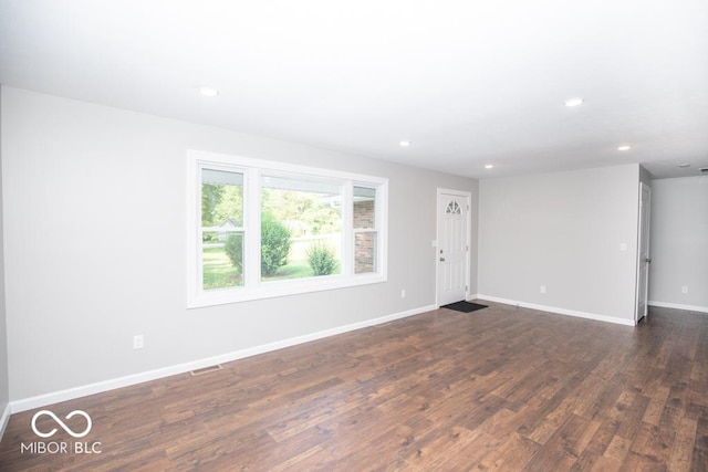 1855 E Deb Dr, North Vernon, IN 47265 - unfurnished room with dark wood-type flooring and recessed lighting
