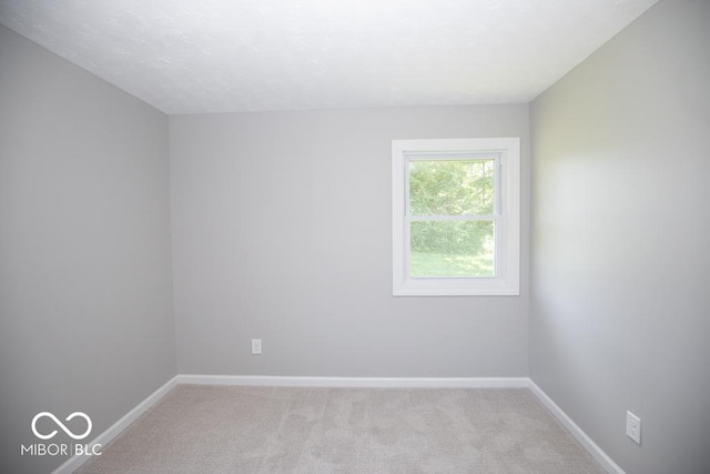 1855 E Deb Dr, North Vernon, IN 47265 - unfurnished room featuring light carpet