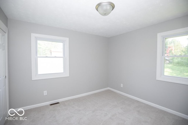 1855 E Deb Dr, North Vernon, IN 47265 - unfurnished bedroom with carpet and baseboards