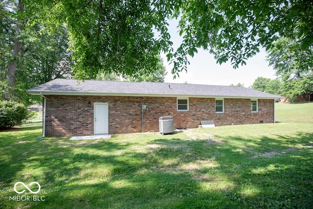 1855 E Deb Dr, North Vernon, IN 47265 - back of house with a lawn and brick siding