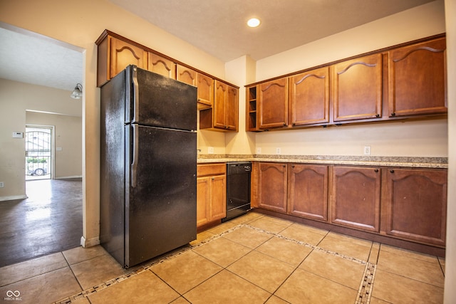 611 N Bradley Ave, Indianapolis, IN 46201 - kitchen featuring black appliances, light tile patterned floors, brown cabinets, and recessed lighting