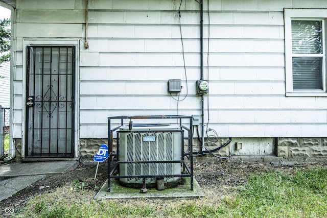 611 N Bradley Ave, Indianapolis, IN 46201 - exterior view of a central air condition unit and electric meter