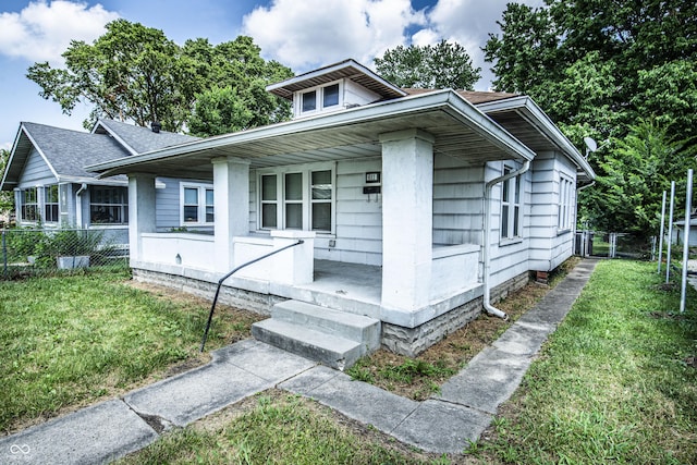 611 N Bradley Ave, Indianapolis, IN 46201 - bungalow-style home featuring covered porch