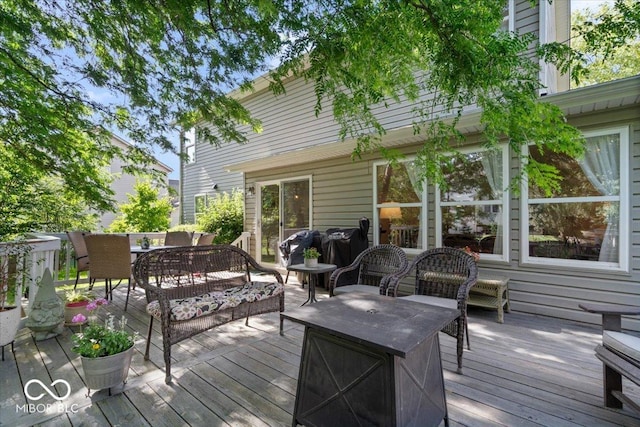 8827 Lindsey Ct, Fishers, IN 46038 - wooden deck featuring an outdoor living space and outdoor dining area