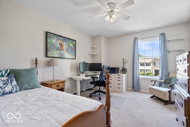 8827 Lindsey Ct, Fishers, IN 46038 - carpeted bedroom with a textured ceiling, an office area, and a ceiling fan