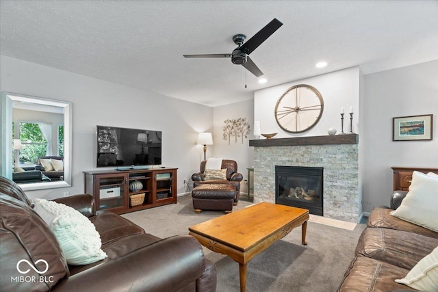 8827 Lindsey Ct, Fishers, IN 46038 - living room with carpet, a ceiling fan, a fireplace, a textured ceiling, and recessed lighting