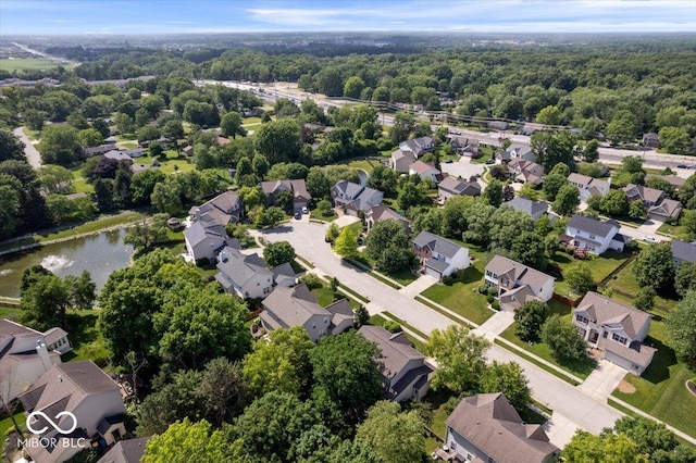 8827 Lindsey Ct, Fishers, IN 46038 - aerial perspective of suburban area with a heavily wooded area and a nearby body of water