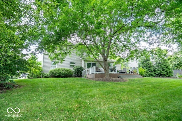 8827 Lindsey Ct, Fishers, IN 46038 - view of green lawn featuring a deck