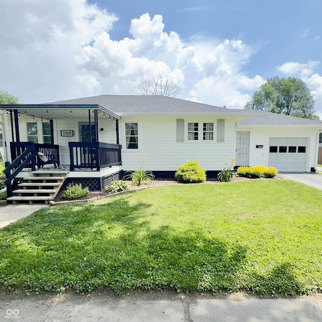 249 N Mill St, Plainfield, IN 46168 - view of front of house featuring a garage, a front lawn, a porch, and driveway
