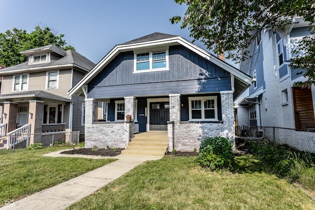 2954 N Washington Blvd, Indianapolis, IN 46205 - view of front of property with a porch and brick siding