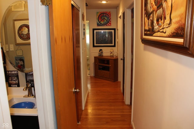 705 Terrace Ln, Greencastle, IN 46135 - hallway featuring wood finished floors and arched walkways