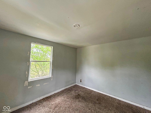 21 N Gladstone Ave, Indianapolis, IN 46201 - spare room featuring baseboards and carpet flooring