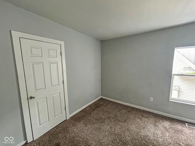 21 N Gladstone Ave, Indianapolis, IN 46201 - empty room featuring carpet and baseboards