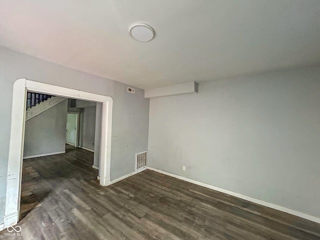 21 N Gladstone Ave, Indianapolis, IN 46201 - empty room featuring dark wood-style floors and baseboards