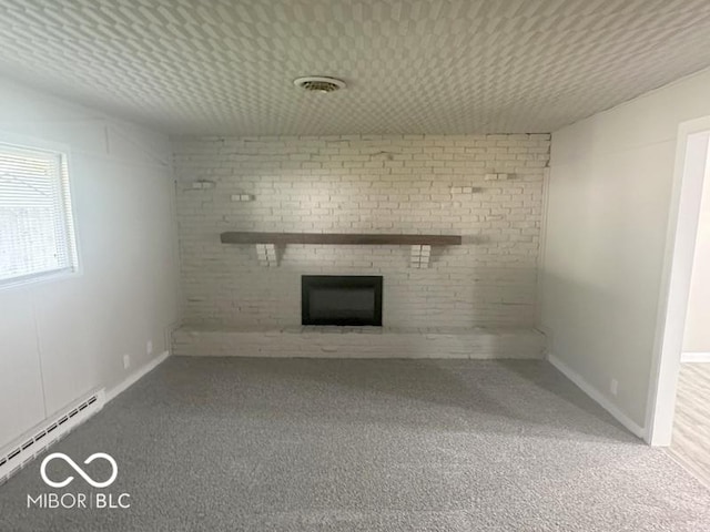 1306 Woodbine Dr, Anderson, IN 46011 - unfurnished living room featuring a brick fireplace, a baseboard heating unit, and carpet floors