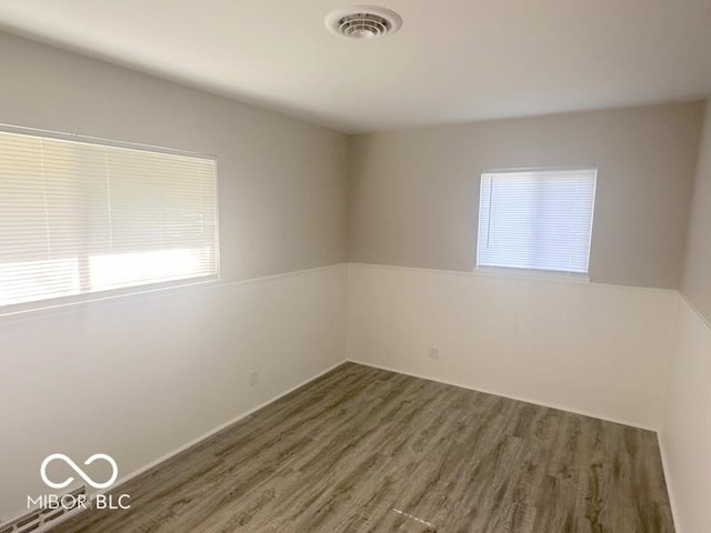1306 Woodbine Dr, Anderson, IN 46011 - empty room with wood finished floors