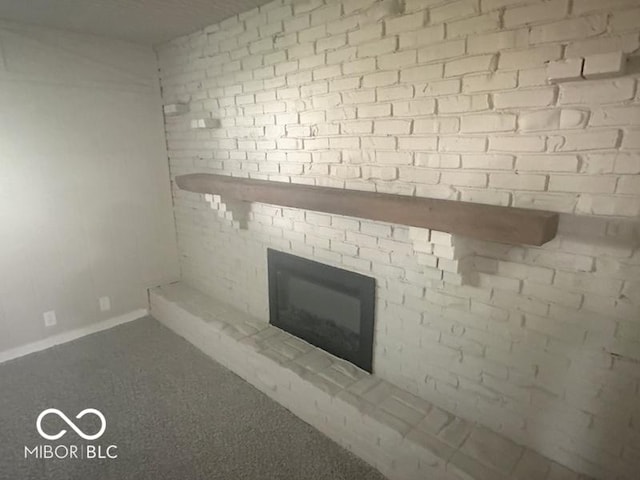 1306 Woodbine Dr, Anderson, IN 46011 - detailed view of a fireplace and carpet floors