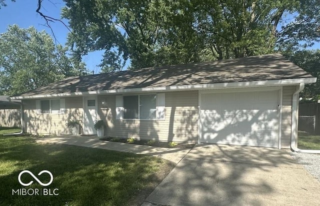 1306 Woodbine Dr, Anderson, IN 46011 - view of front of property featuring concrete driveway and roof with shingles