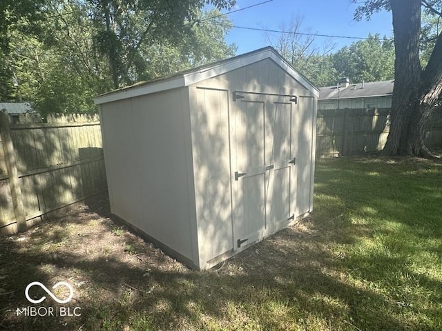 1306 Woodbine Dr, Anderson, IN 46011 - view of shed with a fenced backyard