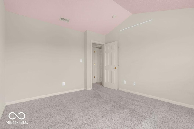 1139 Fernwood Way, Plainfield, IN 46168 - carpeted empty room featuring vaulted ceiling and baseboards