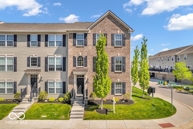 3546 Brampton Ln, Westfield, IN 46074 - townhome / multi-family property with brick siding and a front yard