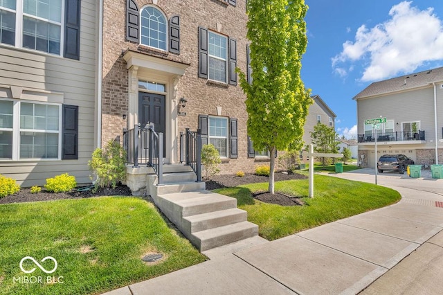 3546 Brampton Ln, Westfield, IN 46074 - property entrance with brick siding and a lawn
