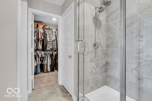 3546 Brampton Ln, Westfield, IN 46074 - full bath with a shower stall, a walk in closet, and tile patterned flooring