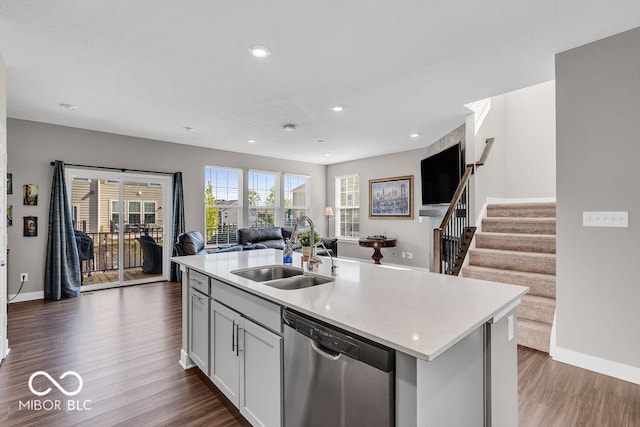 3546 Brampton Ln, Westfield, IN 46074 - kitchen with stainless steel dishwasher, open floor plan, dark wood-style flooring, recessed lighting, and a kitchen island with sink