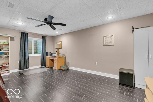 720 Willow Pointe N Dr, Plainfield, IN 46168 - unfurnished office with a ceiling fan, a paneled ceiling, and dark wood-style flooring
