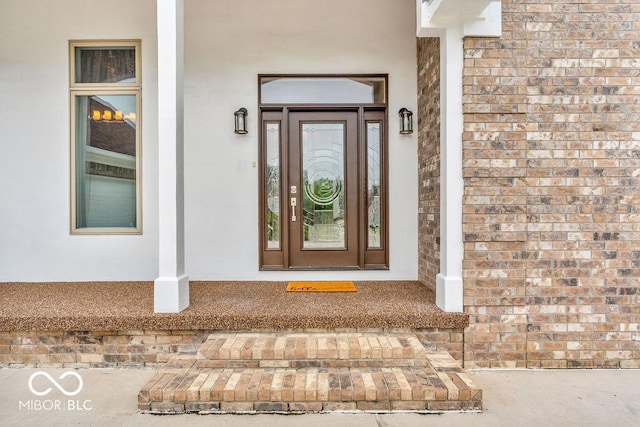720 Willow Pointe N Dr, Plainfield, IN 46168 - view of exterior entry with stucco siding and brick siding