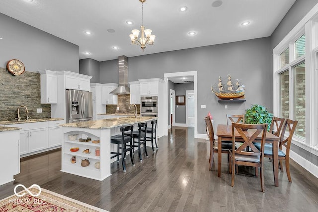 720 Willow Pointe N Dr, Plainfield, IN 46168 - kitchen with stainless steel appliances, wall chimney range hood, open shelves, white cabinets, and backsplash