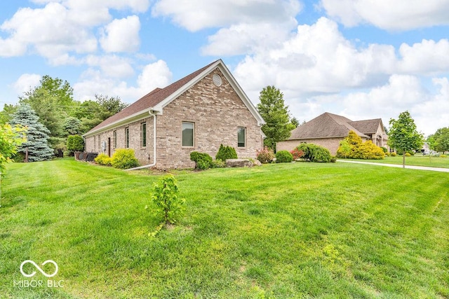 720 Willow Pointe N Dr, Plainfield, IN 46168 - view of property exterior with brick siding and a lawn