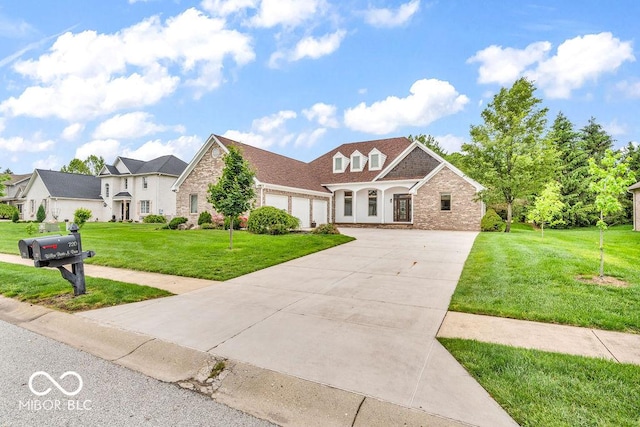 720 Willow Pointe N Dr, Plainfield, IN 46168 - view of front facade with concrete driveway, a front lawn, stone siding, and a garage