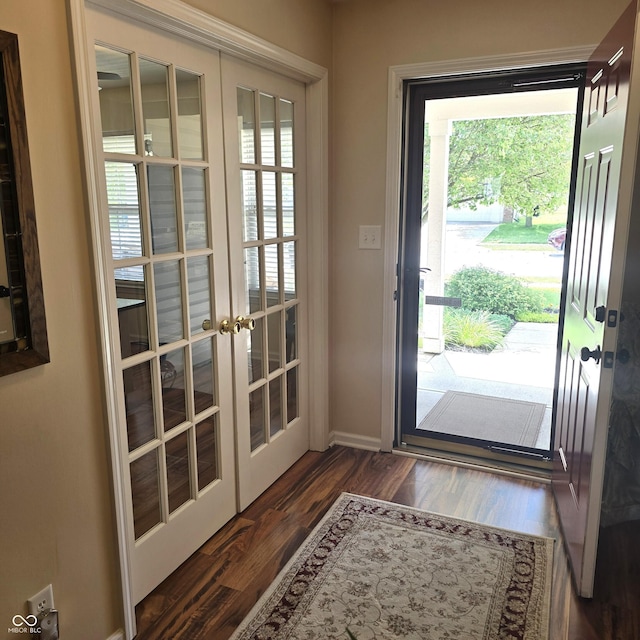 7608 Mather Ln, Indianapolis, IN 46239 - entryway featuring french doors and wood finished floors