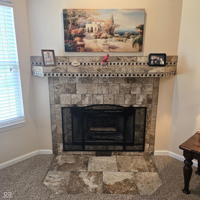 7608 Mather Ln, Indianapolis, IN 46239 - detailed view of a tile fireplace and carpet floors