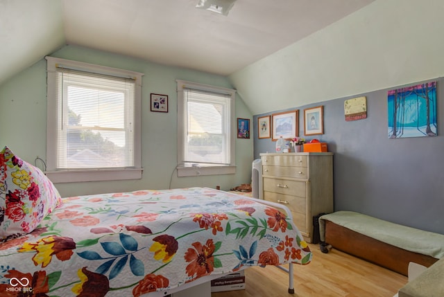 238 S 5th Ave, Beech Grove, IN 46107 - bedroom with wood finished floors and vaulted ceiling